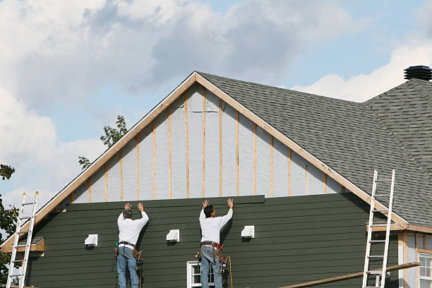 Professional Siding Installation technician working in Westwood, MA
